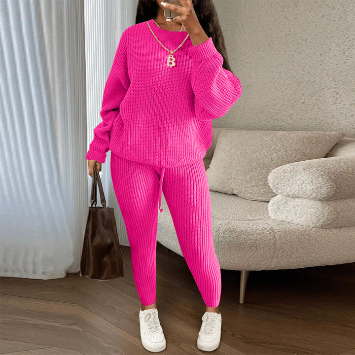 Woman in ribbed knit jumper and trousers set