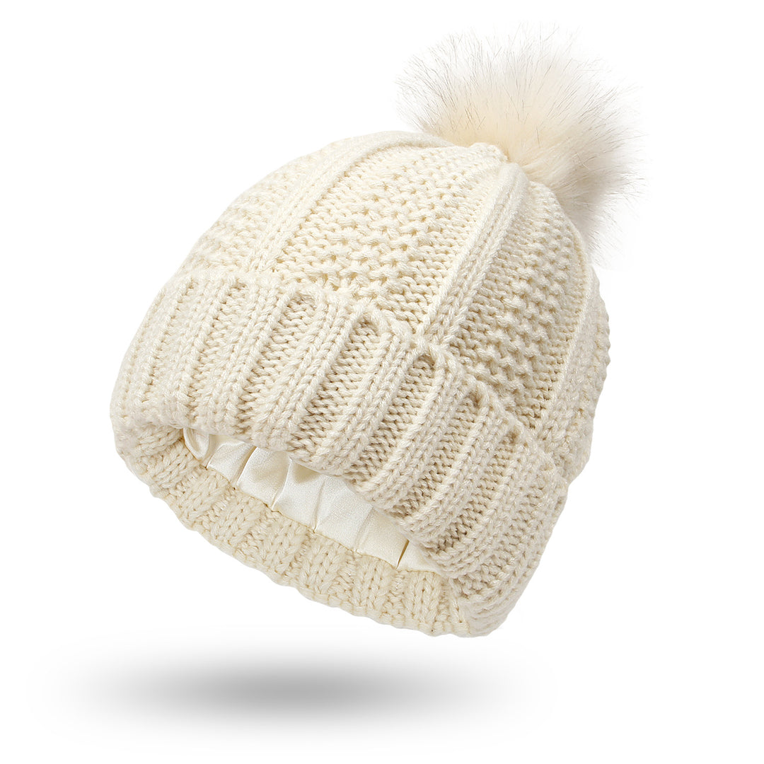Chunky knit beanie with faux fur pom pom