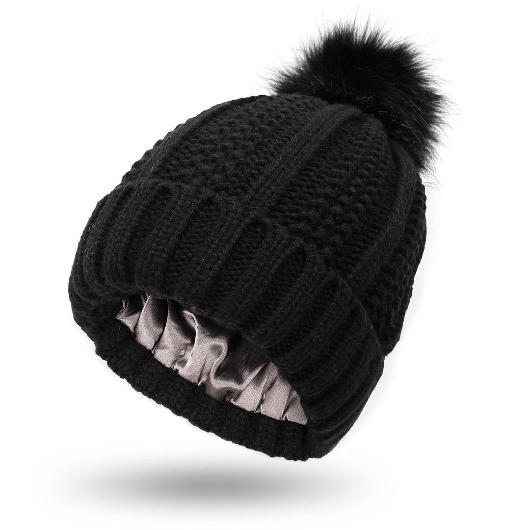 Chunky knit beanie with faux fur pom pom