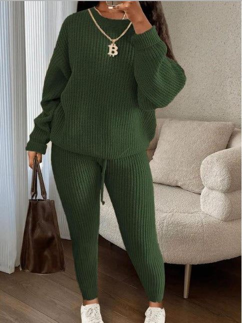 Woman in ribbed knit jumper and trousers set