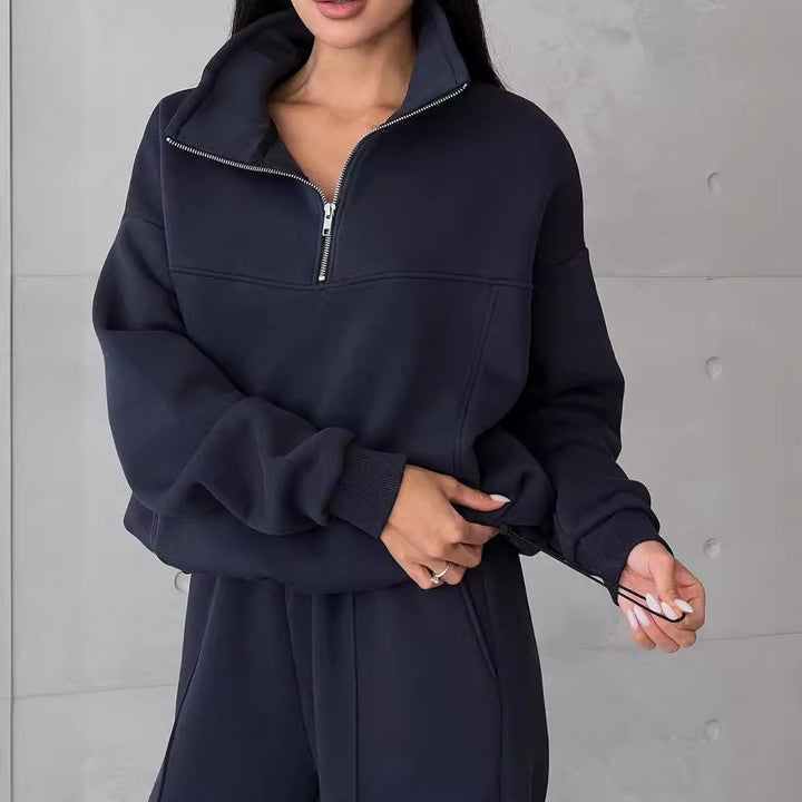 Woman in a fleece half-zip tracksuit